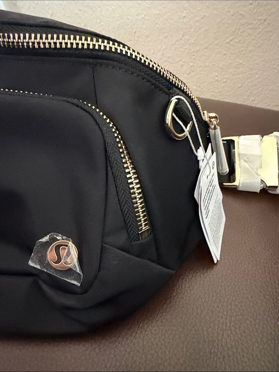 lululemon bag with gold zipper Black Vegas Golden Knights Crossbody Camera Ring Clips Onto Your Favourite Bag lululemon athletica | Bags |
